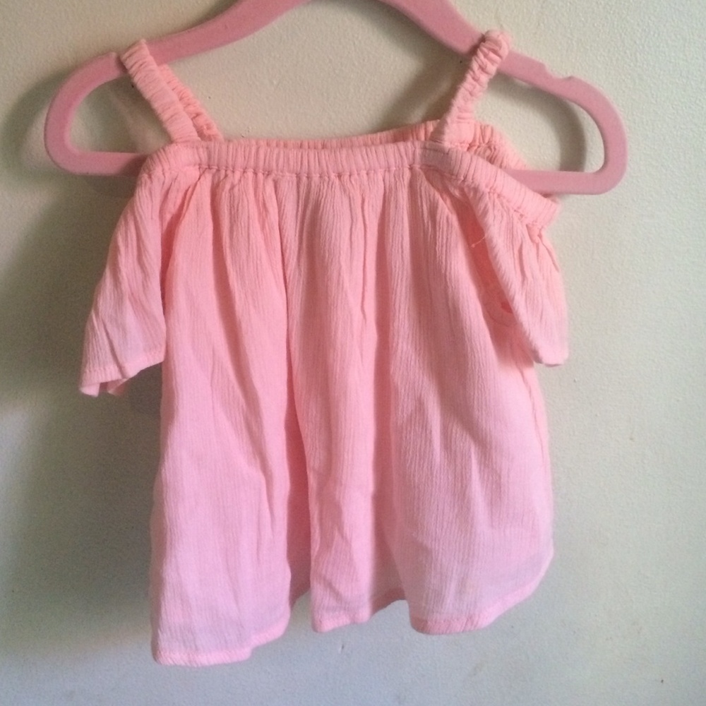 Pink top.
